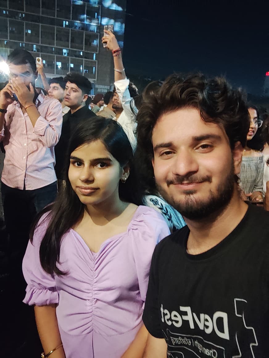 Manik and an Inner Circle student at an evening event